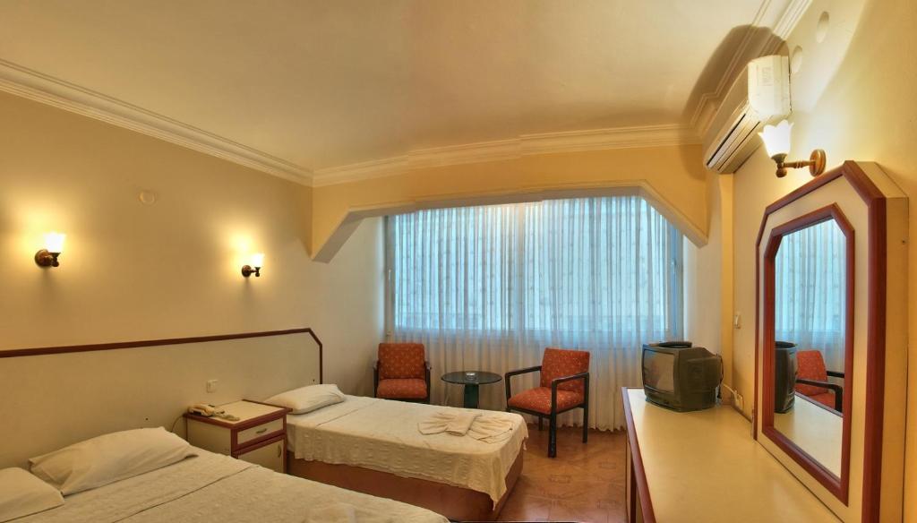 Hotel Santur Kusadası Rom bilde